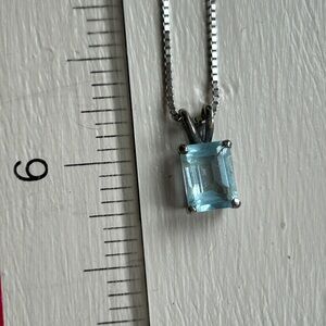 925 SS necklace with baby blue emerald cut stone